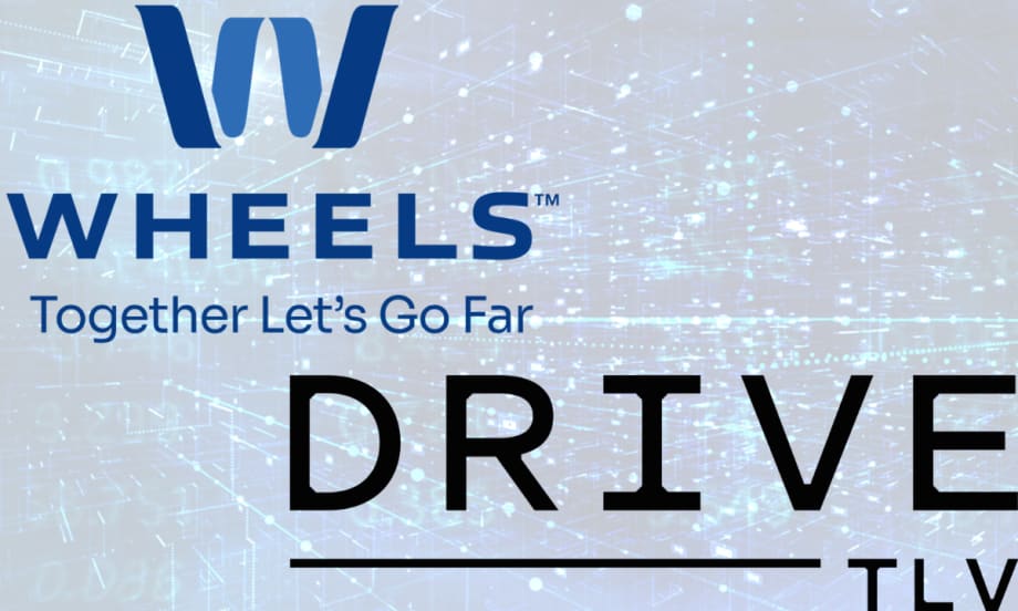 The Wheels and Drive TLV logo is bolded and overlays a blue, futuristic background.