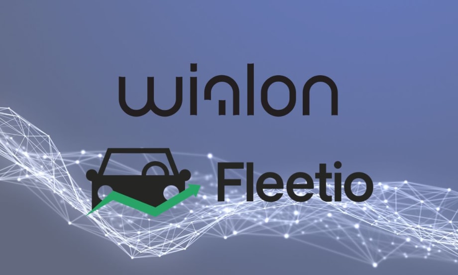 Wialon and Fleetio logos in front of a picture of lines that connect.