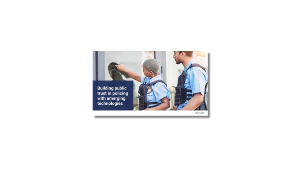 Two police officers in tactical vests, demonstrating emerging law enforcement technology