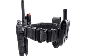A close up of a police holster with assorted pockets for officers' equipment.