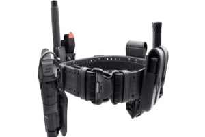 A close up of a police holster with assorted pockets for officers' equipment.