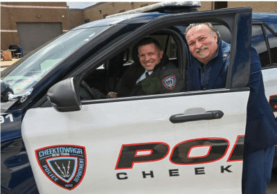 Officer smiling with an executive