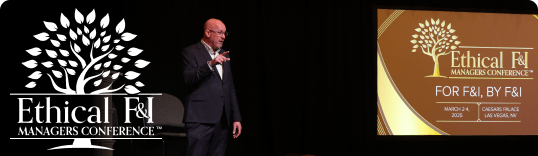 Speaker presenting on stage at the Ethical F&I Managers Conference, with event logo and Las Vegas details displayed on screen.