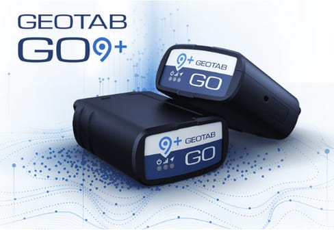 Two black Geotab GO9+ devices are shown on a light blue background with a network of dotted lines and dots.
