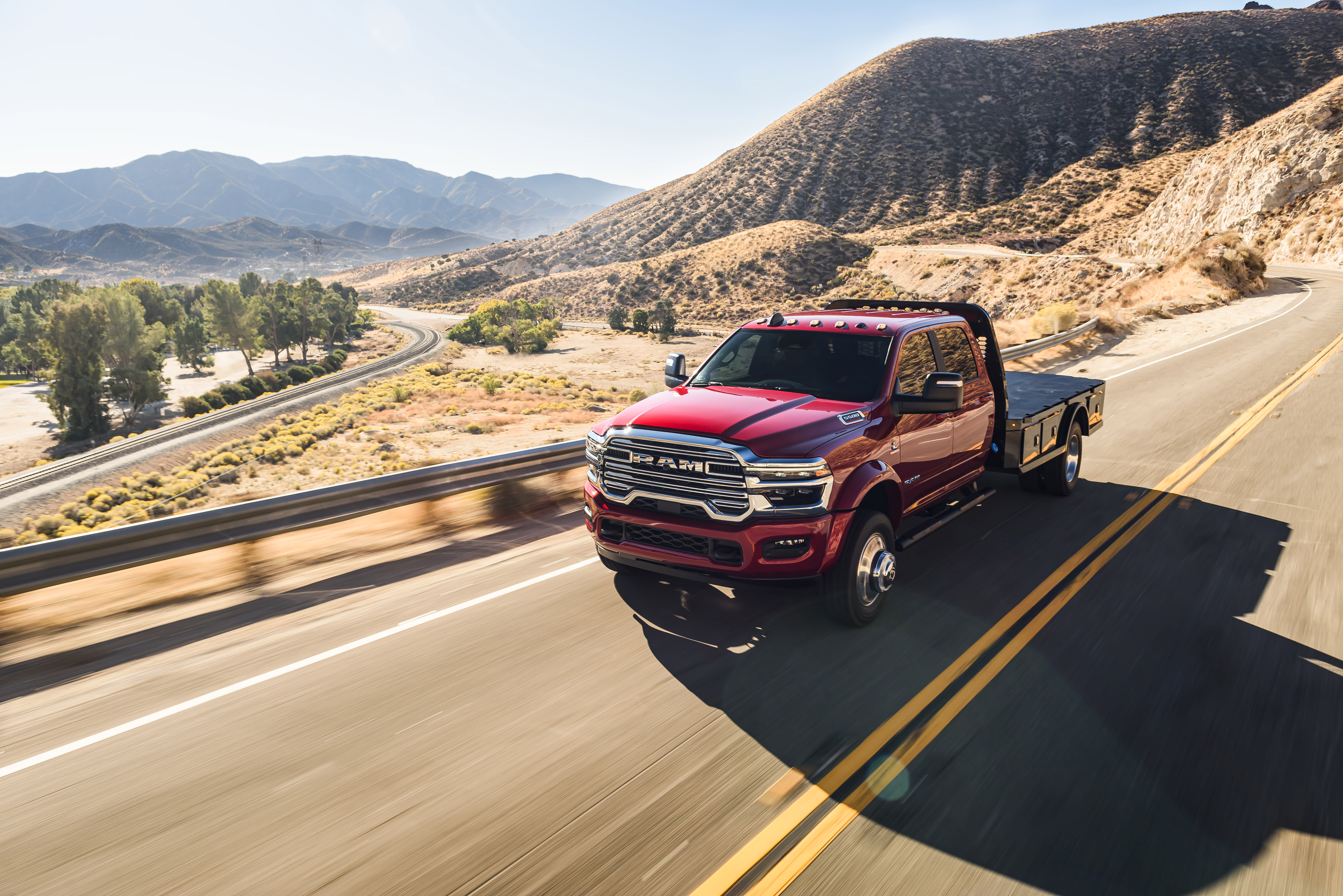 Stellantis RAM Red Pickup Truck on a road